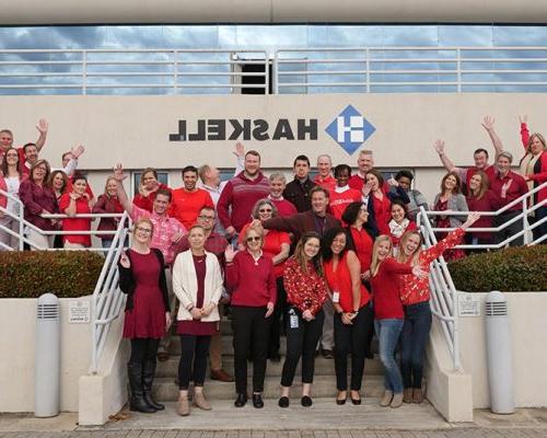 Group of 澳门足彩app employees "wearing the red" in support of the American Heart Association