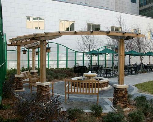 Exterior photo of courtyard with a pergola at Baptist Medical Center South