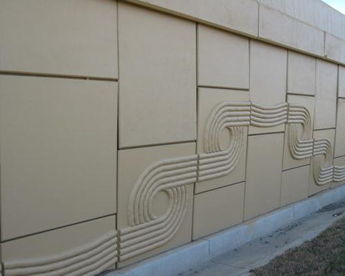 Detail of concrete retaining wall with decorative design